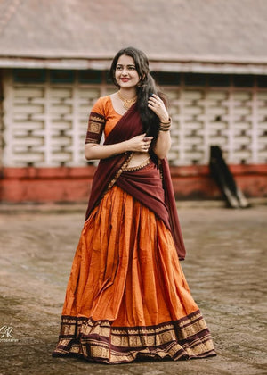 Orange and maroon Kanchi cotton half saree lehenga with zari temple border
