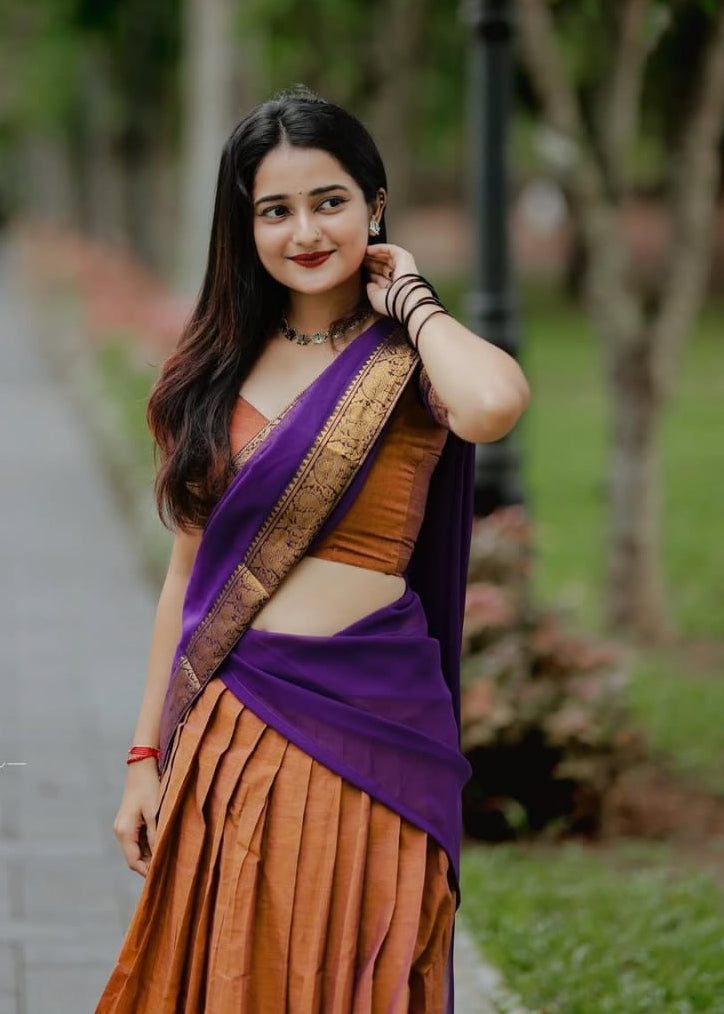 South Indian langa voni in copper rust Kanchi cotton with purple dupatta
