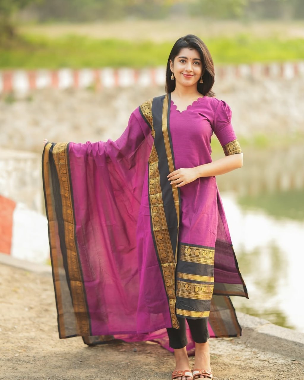 Traditional kurta set magenta with black dupatta and gold zari palla
