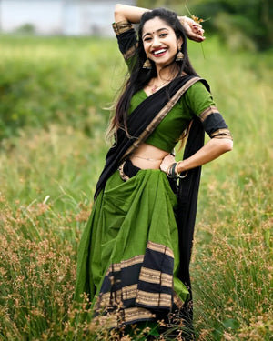 Olive green and black Kanchi cotton half saree lehenga with zari temple border
