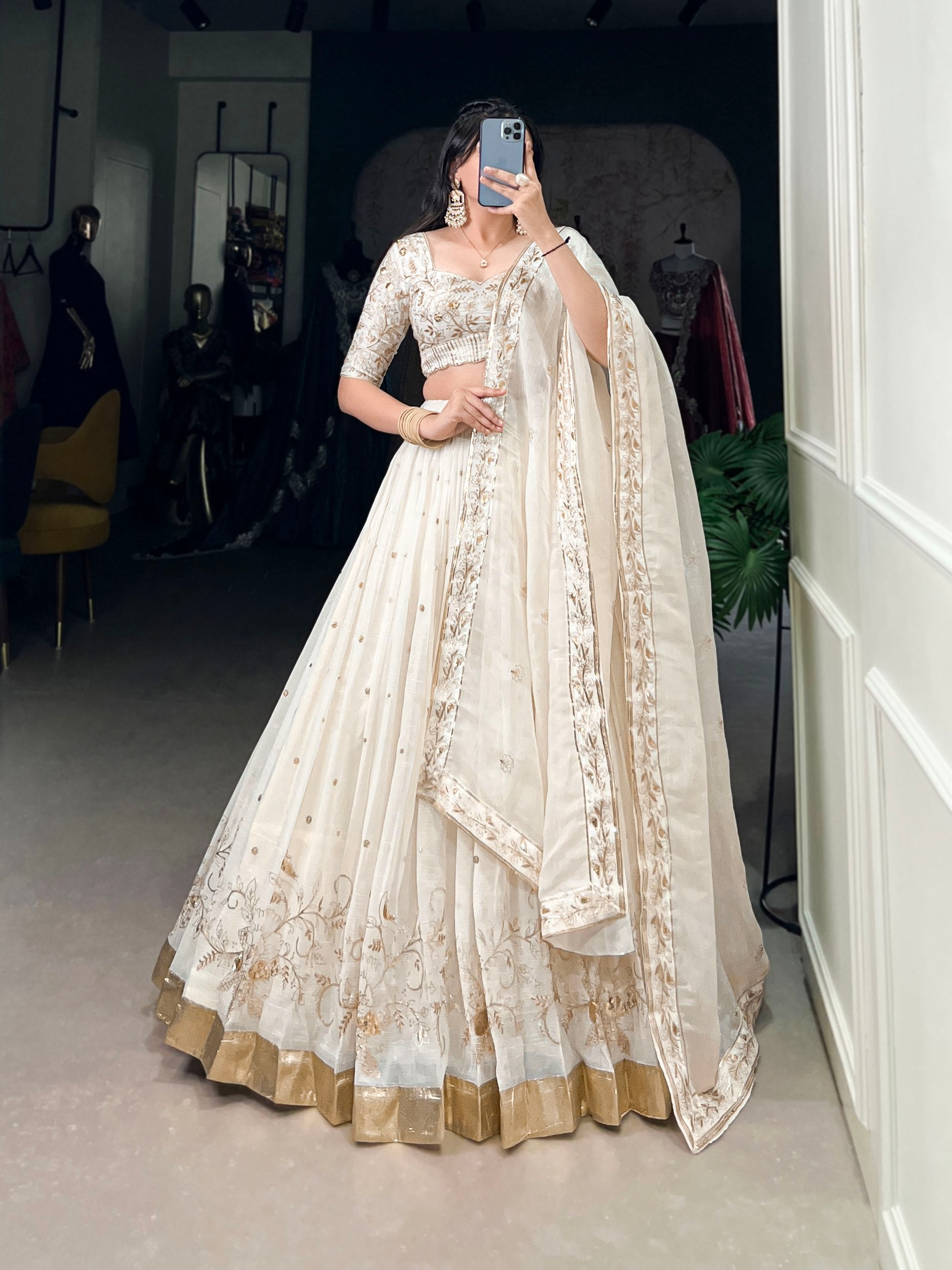 Off White Silver Glosy Sequins And Embroidery With Foil Work Lehenga Choli