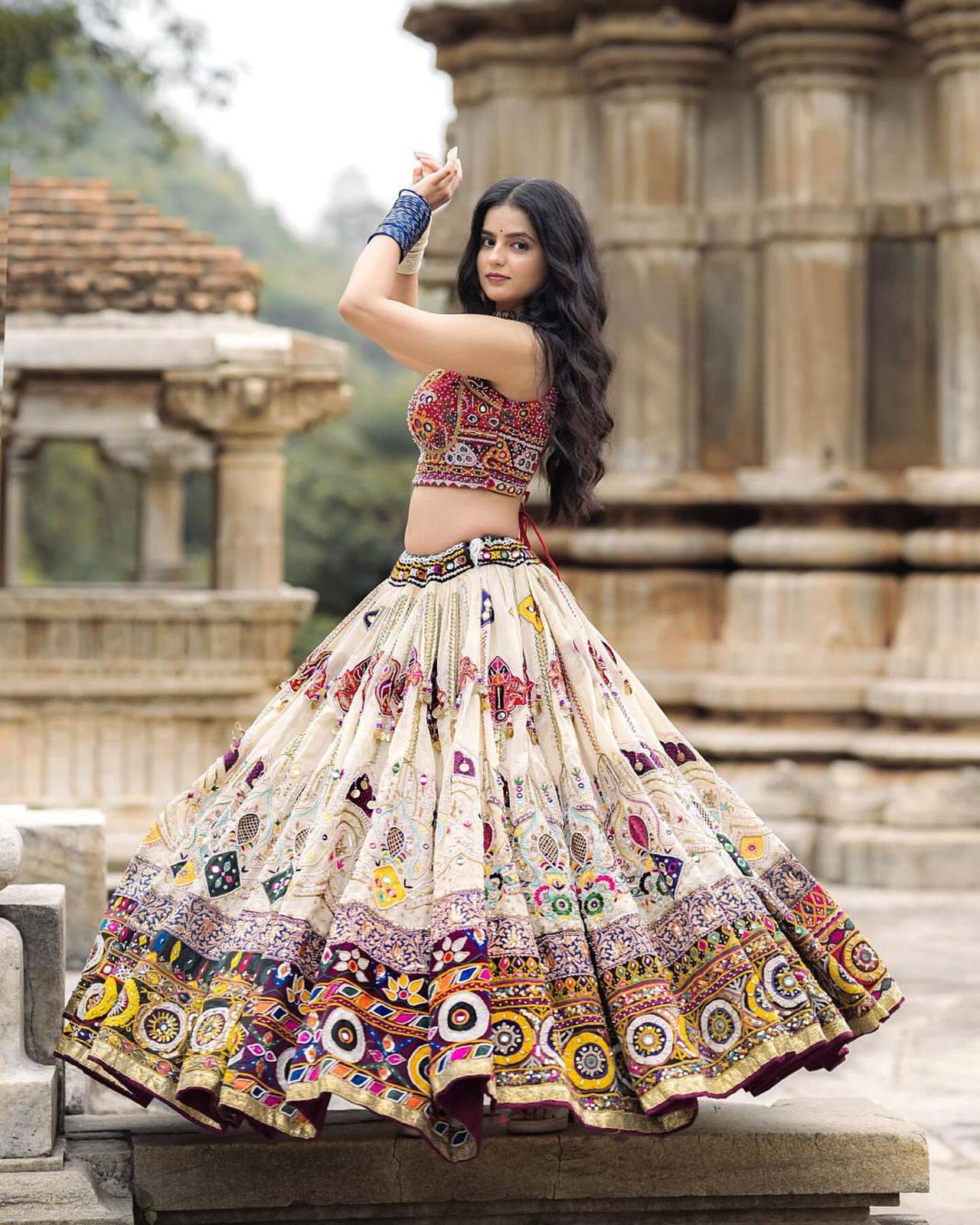 White Kutchi embroidered choli with mirror and thread work

