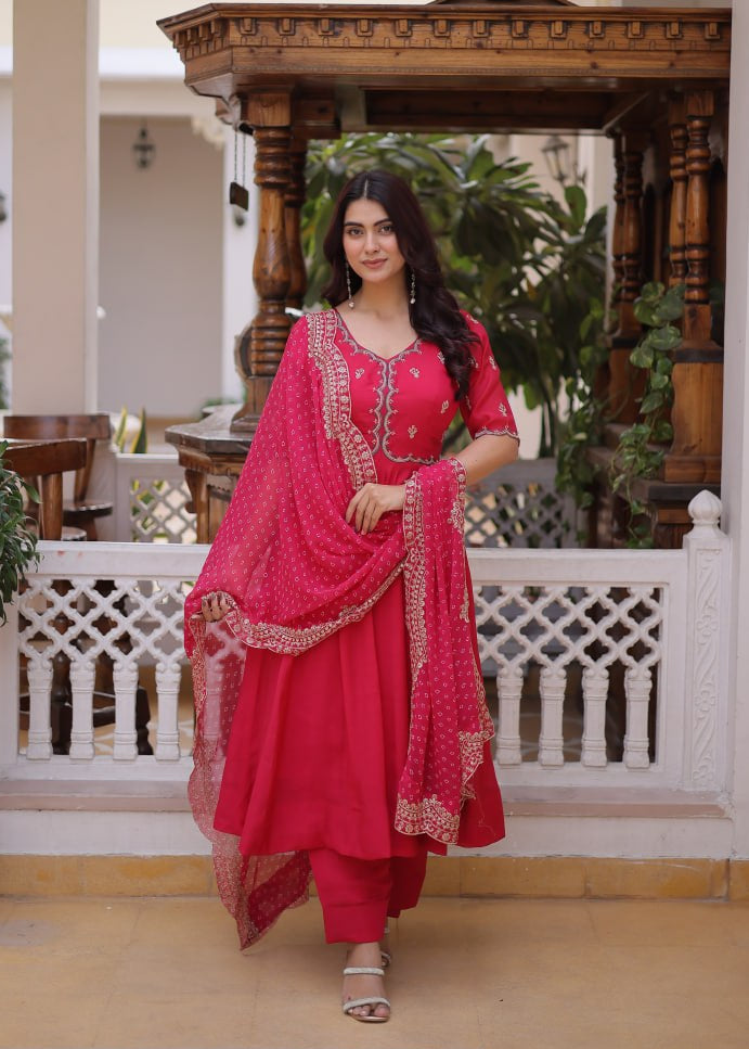 Rani Pink Mal Chanderi Anarkali Suit with gold beads thread embroidery and scalloped dupatta by The Beauty Queen Surat.