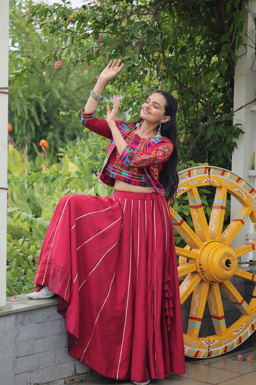 Maroon Roman Fabric With Kutchi Gamthi Embroidered Work Navratri Lehenga Choli