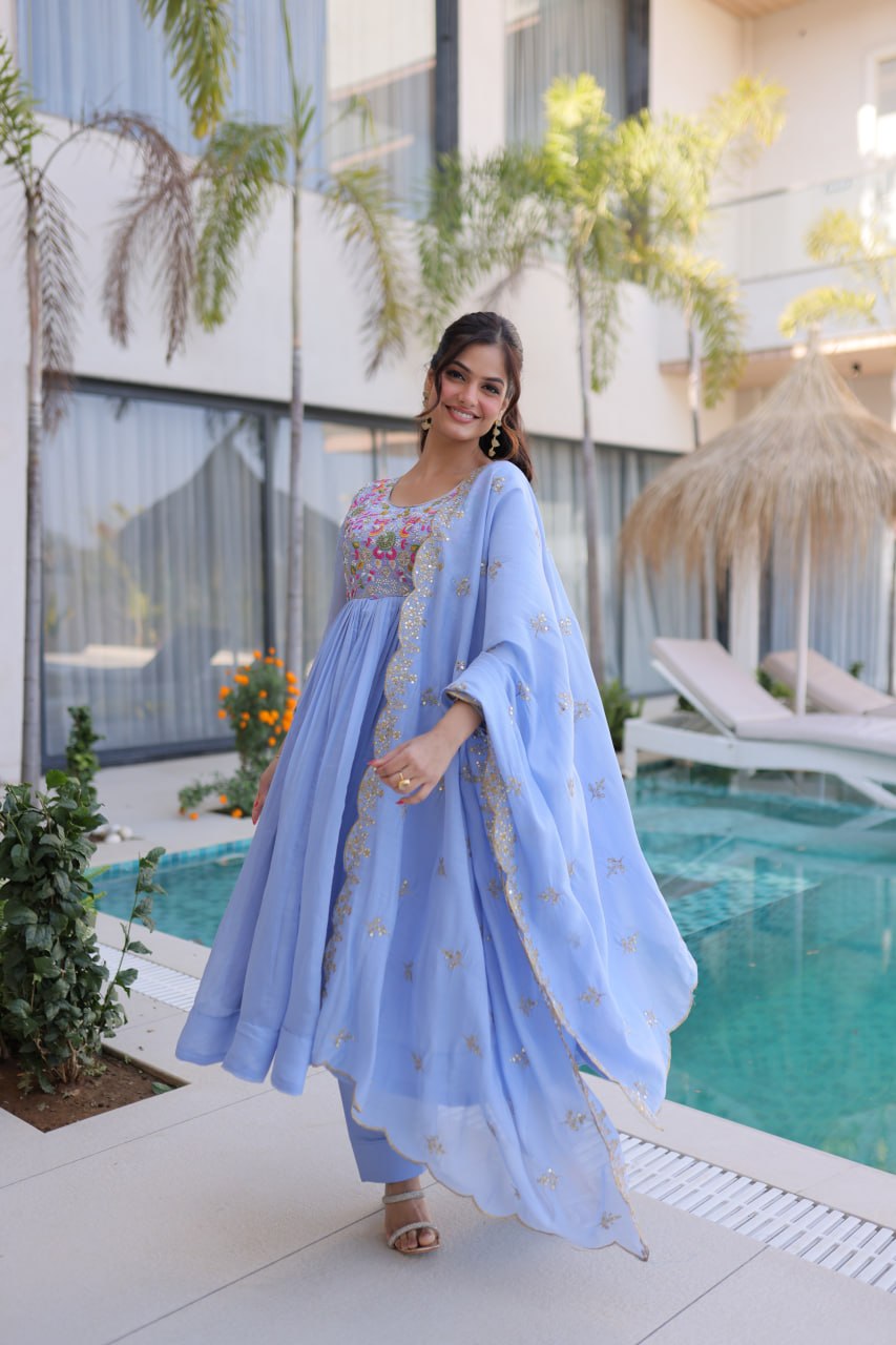 Sky Blue Mal Chanderi Anarkali Suit with multicolored floral beads embroidery and scalloped dupatta by The Beauty Queen Surat.