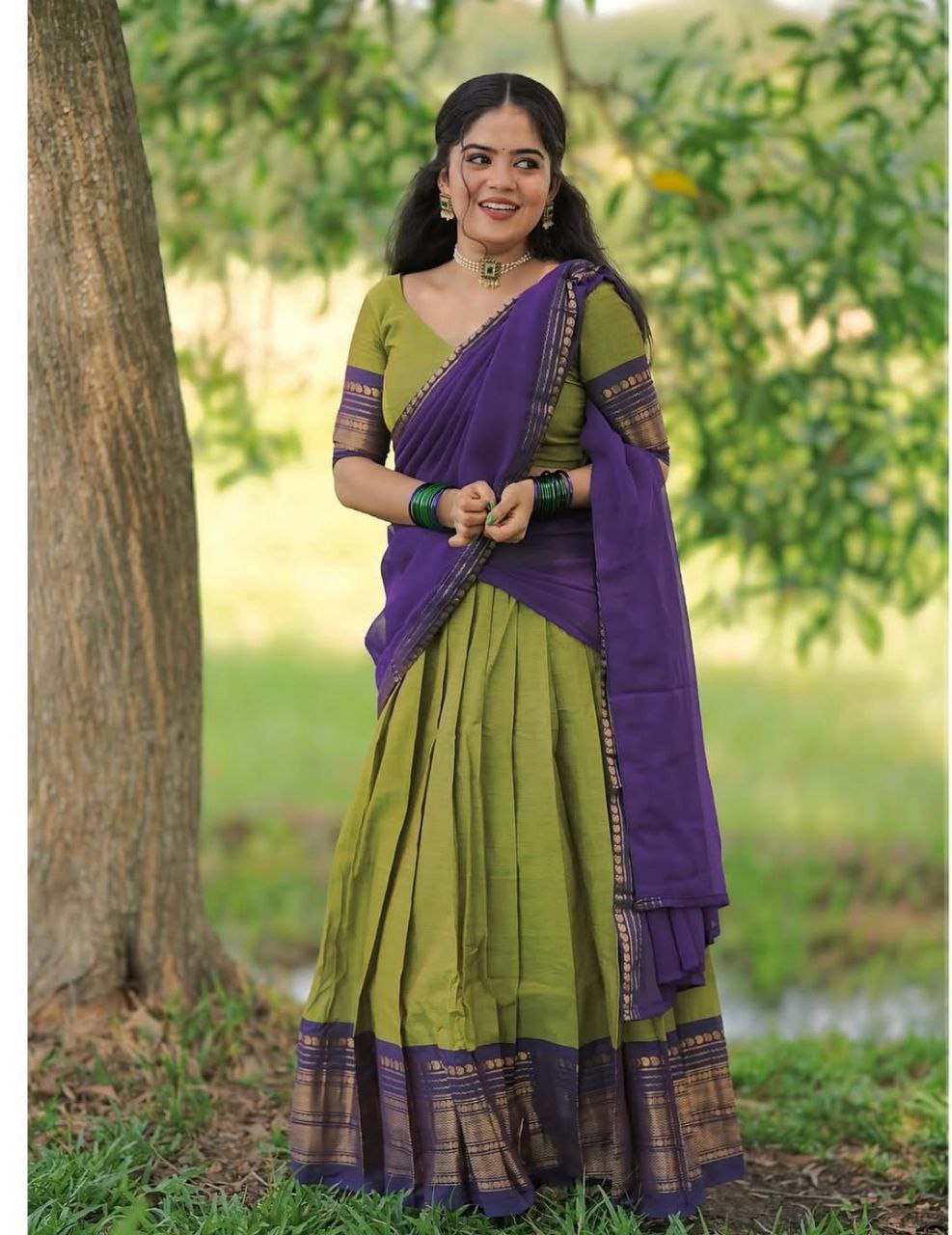 Mehendi Green Kanjivaram Silk Half Saree with Purple Contrast Zari Weaving Border by The Beauty Queen Surat