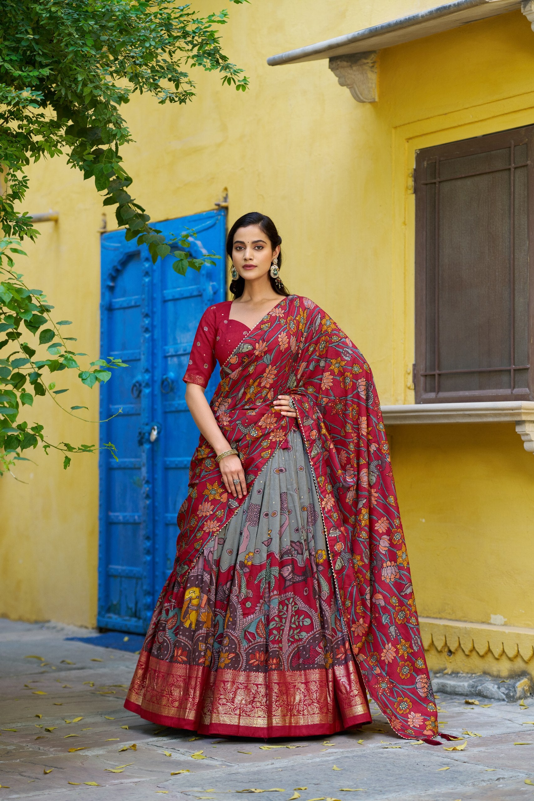 Grey Tasar Silk Lehenga with Cherry Red Dupatta, Kalamkari Print, and Gold Foil Work Border by The Beauty Queen Surat
