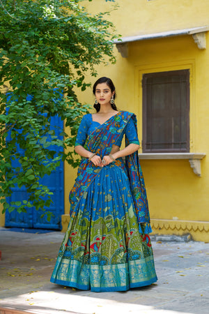 Sky Blue and Sea Green Tasar Silk Lehenga with Kalamkari Print and Gold Foil Work Border by The Beauty Queen Surat