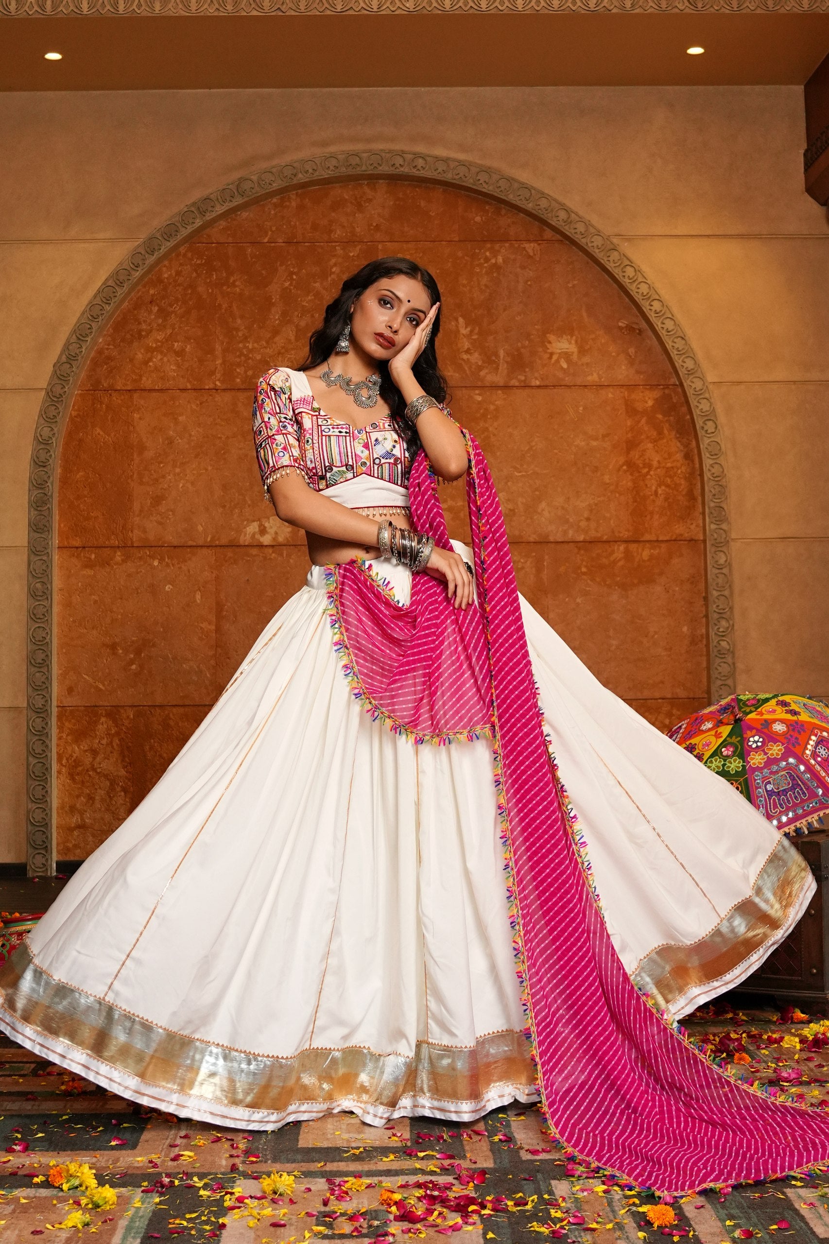 Off-White and Pink Crepe Navratri Lehenga Choli featuring Gota Patti lace, embroidery, and mirror work by The Beauty Queen