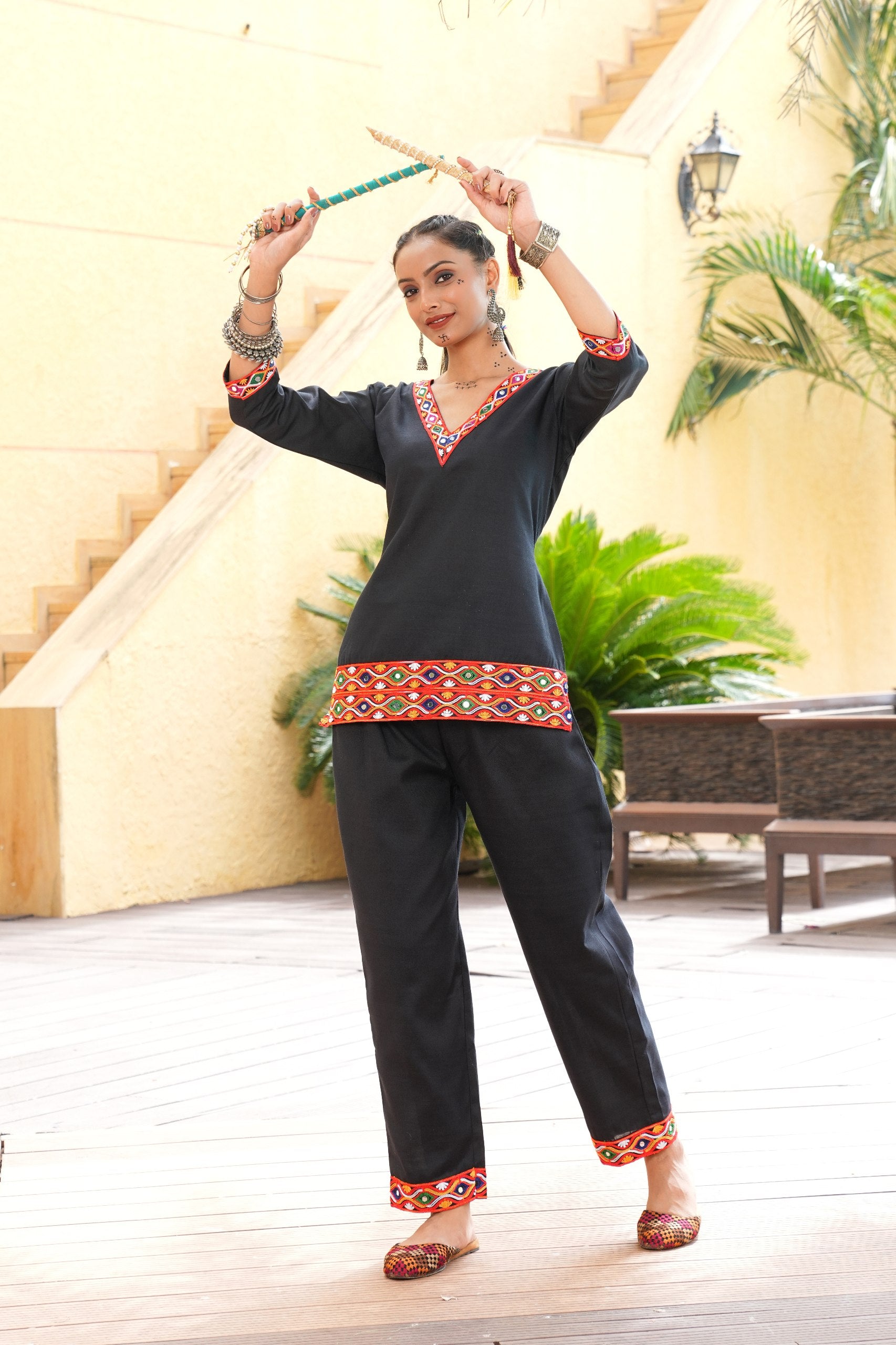 Black Cotton Navratri Co-ord Set featuring a V-neck tunic and pants with original mirror work and embroidery by The Beauty Queen