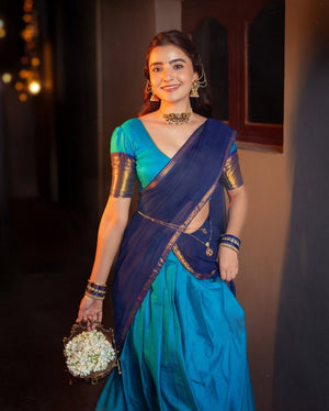 Pavadai dhavani Kanchi cotton with gold zari border
