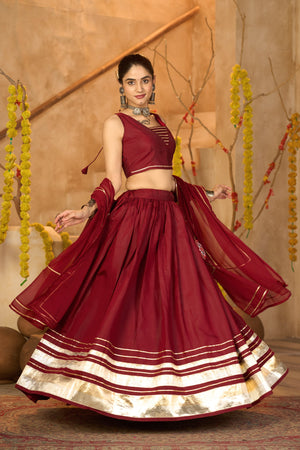 Maroon Cotton Silk Navratri Lehenga Choli with elegant Gota Patti lace work and V-neck sleeveless blouse by The Beauty Queen
