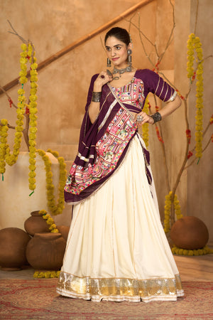 Off-White and Purple Crepe Navratri Lehenga Choli with Gota Patti lace, embroidery, and mirror work by The Beauty Queen