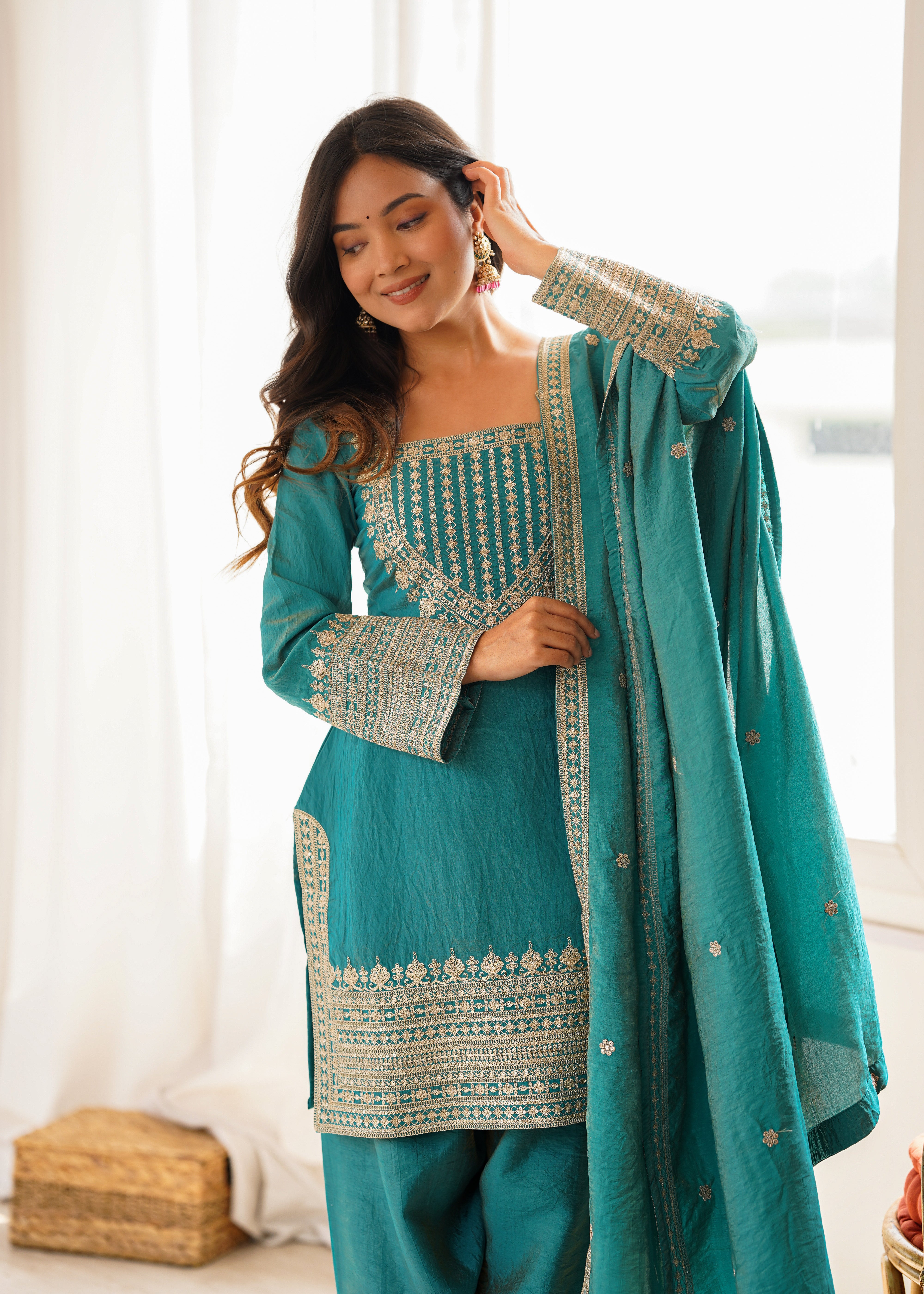 Sea green kurta with patiala salwar and embroidered dupatta
