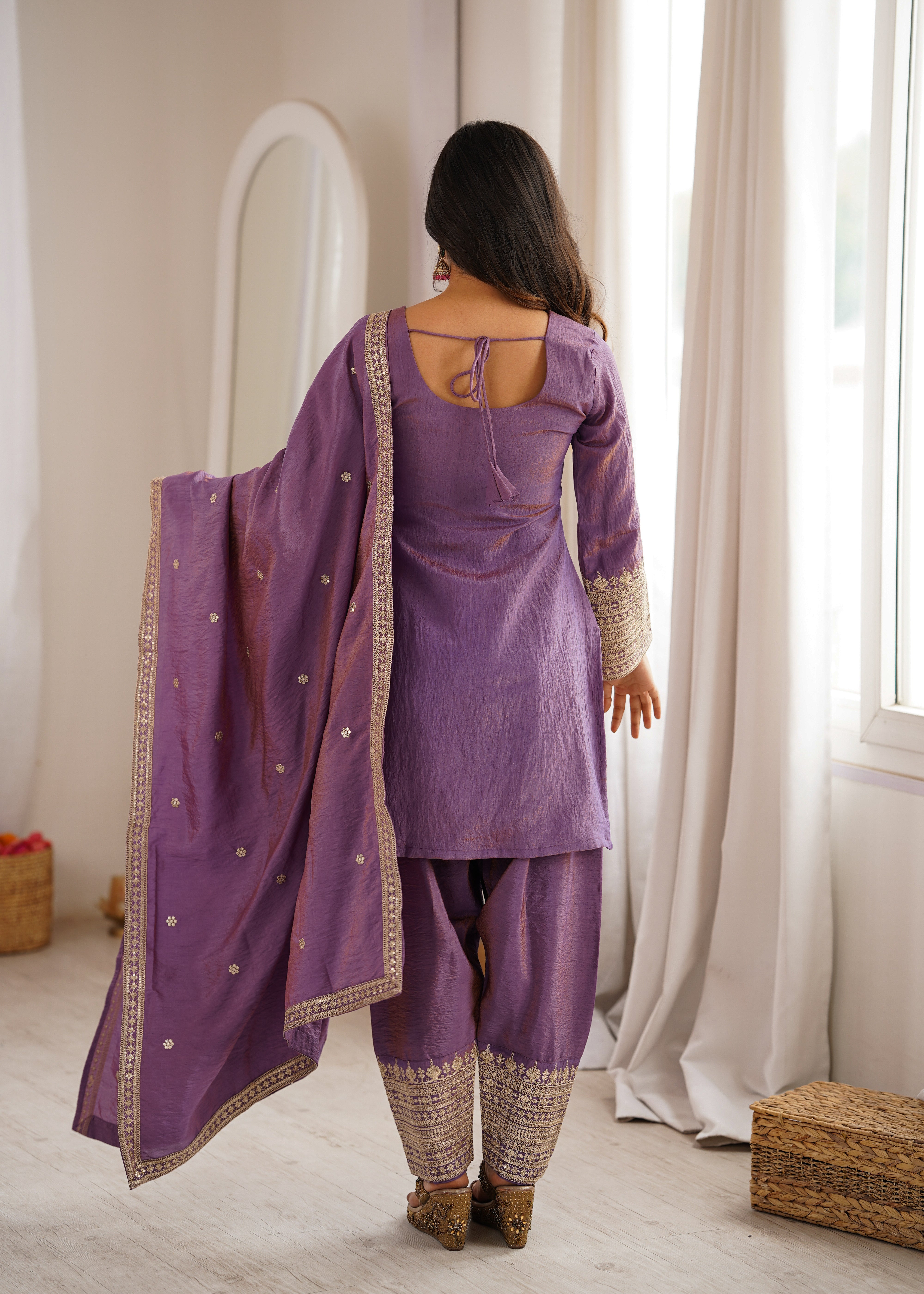 Designer onion pink Vichitra silk suit with embellished hem and yoke embroidery
