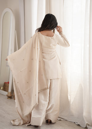 Designer cream glass roman silk suit with embellished hem band
