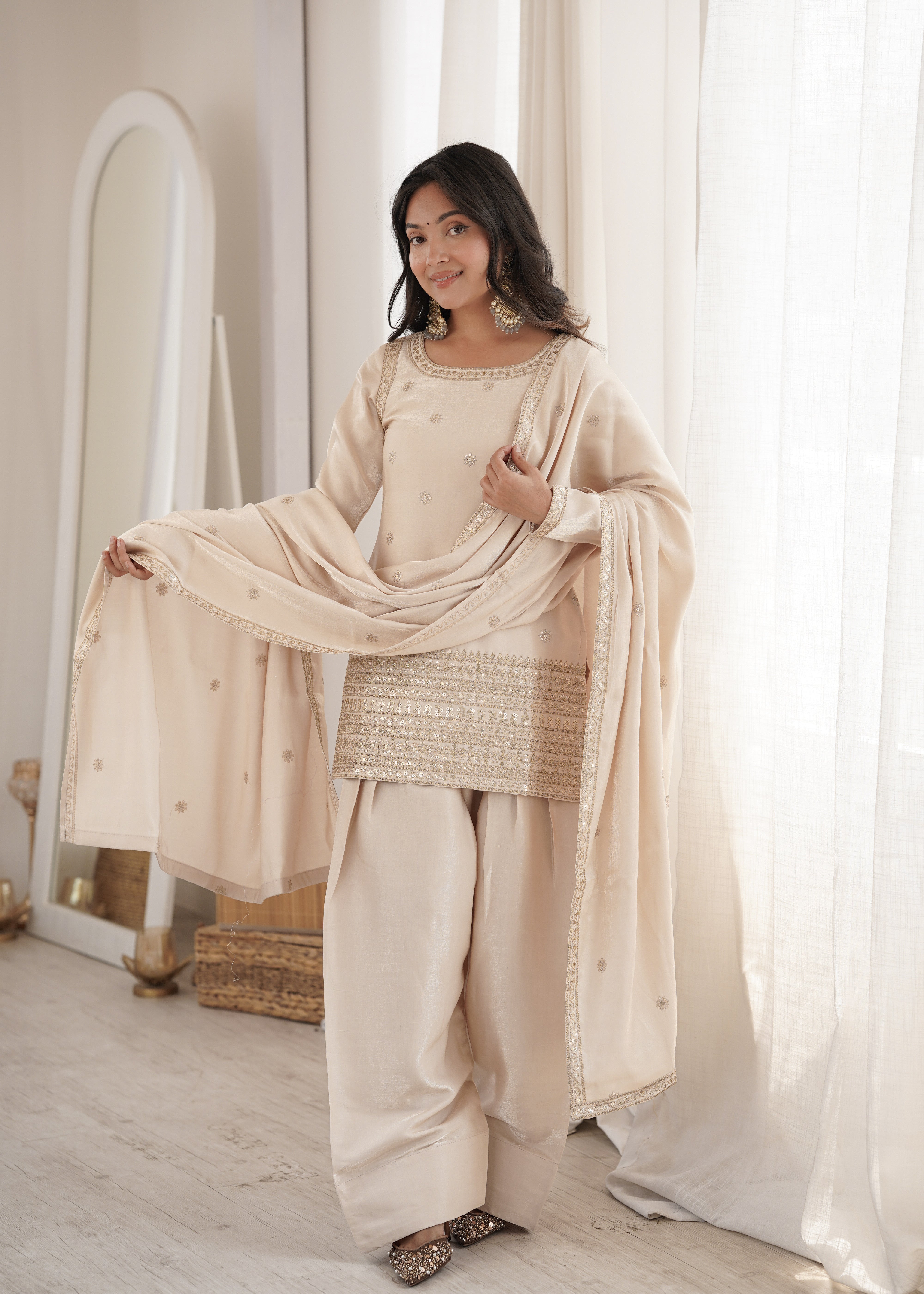 Cream glass roman silk kurta patiala salwar set with sequin dori and zari embroidery
