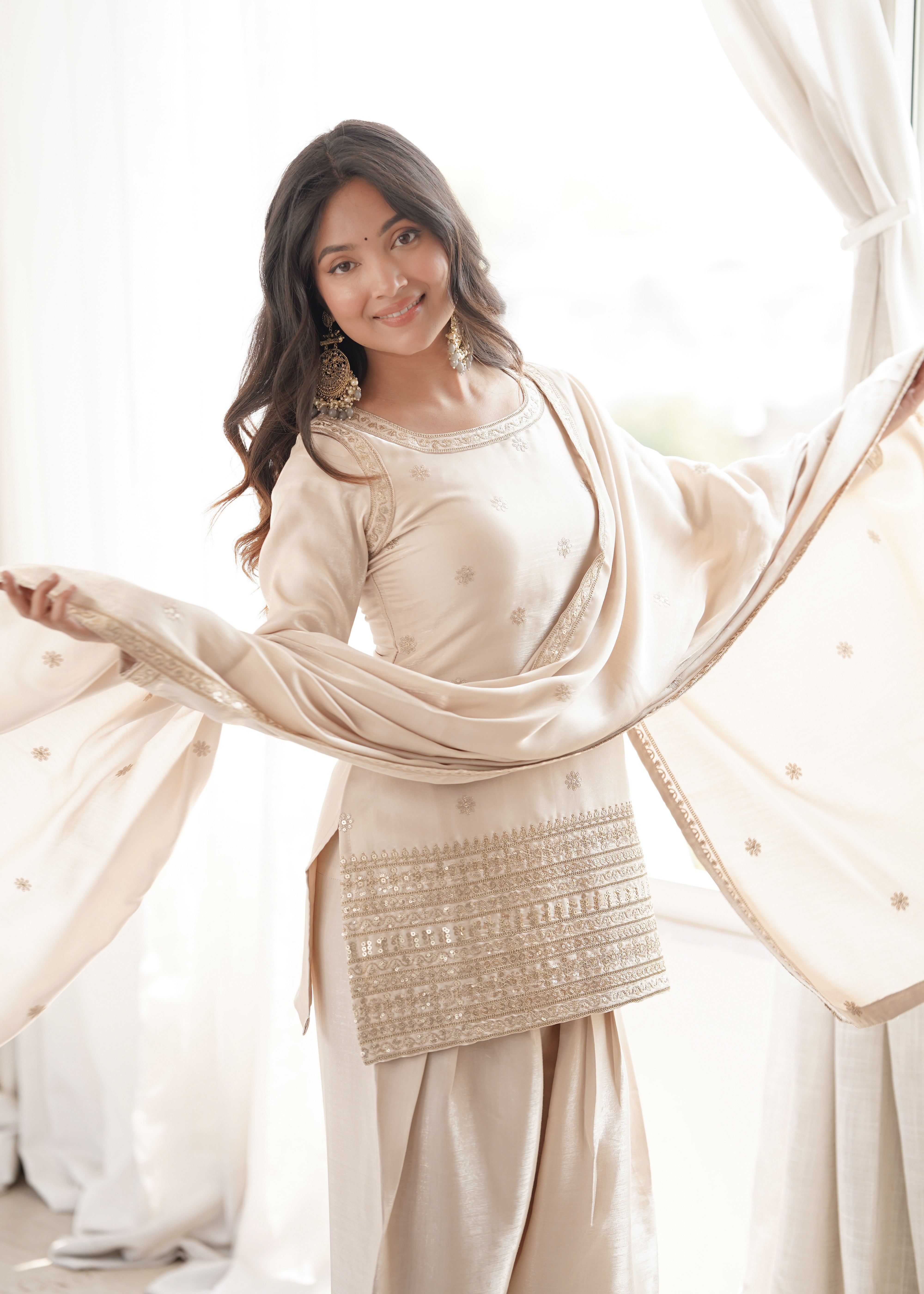 Ivory kurta with patiala salwar and floral embroidered dupatta
