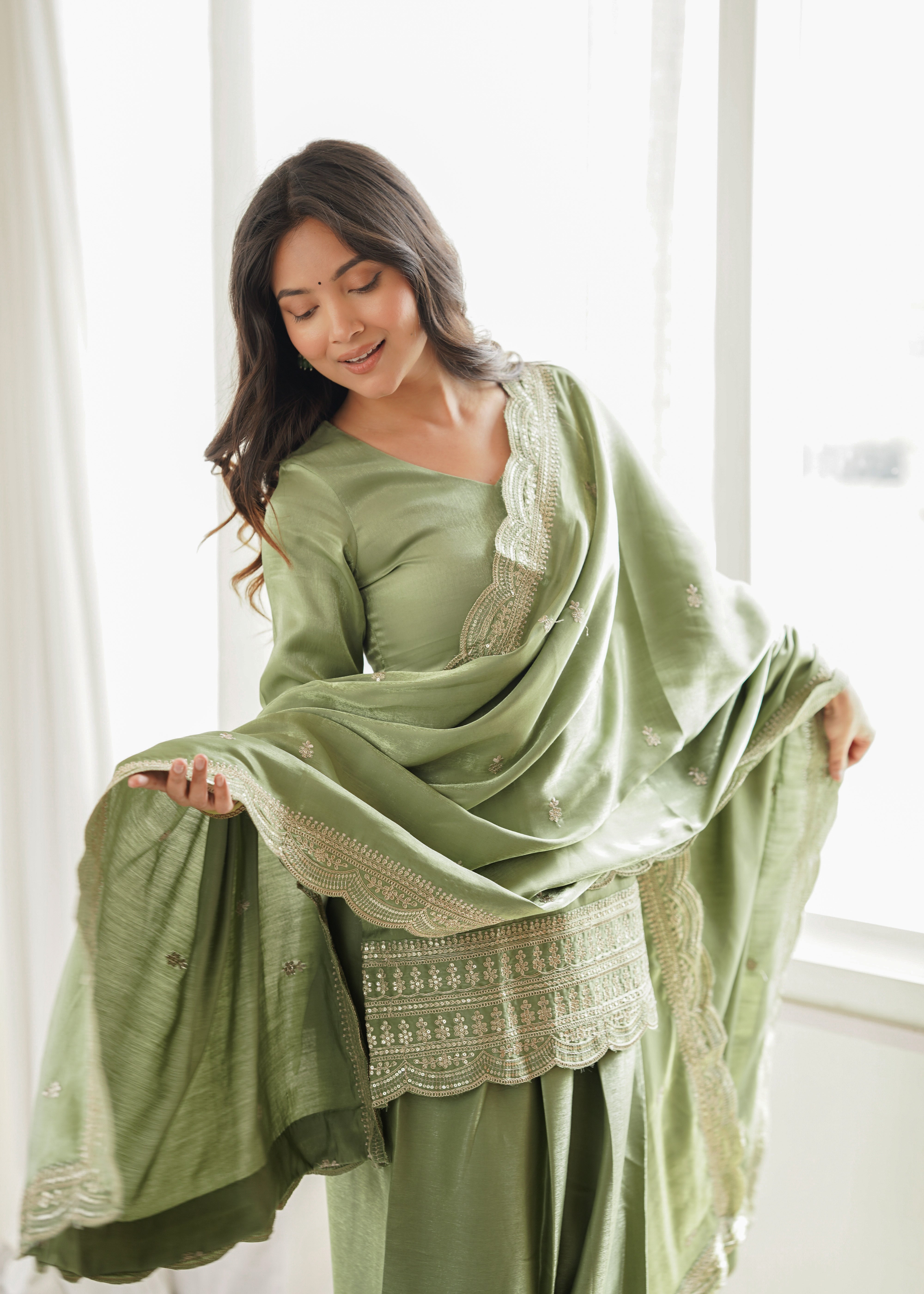 Sage green kurta with patiala salwar and scalloped embroidered dupatta
