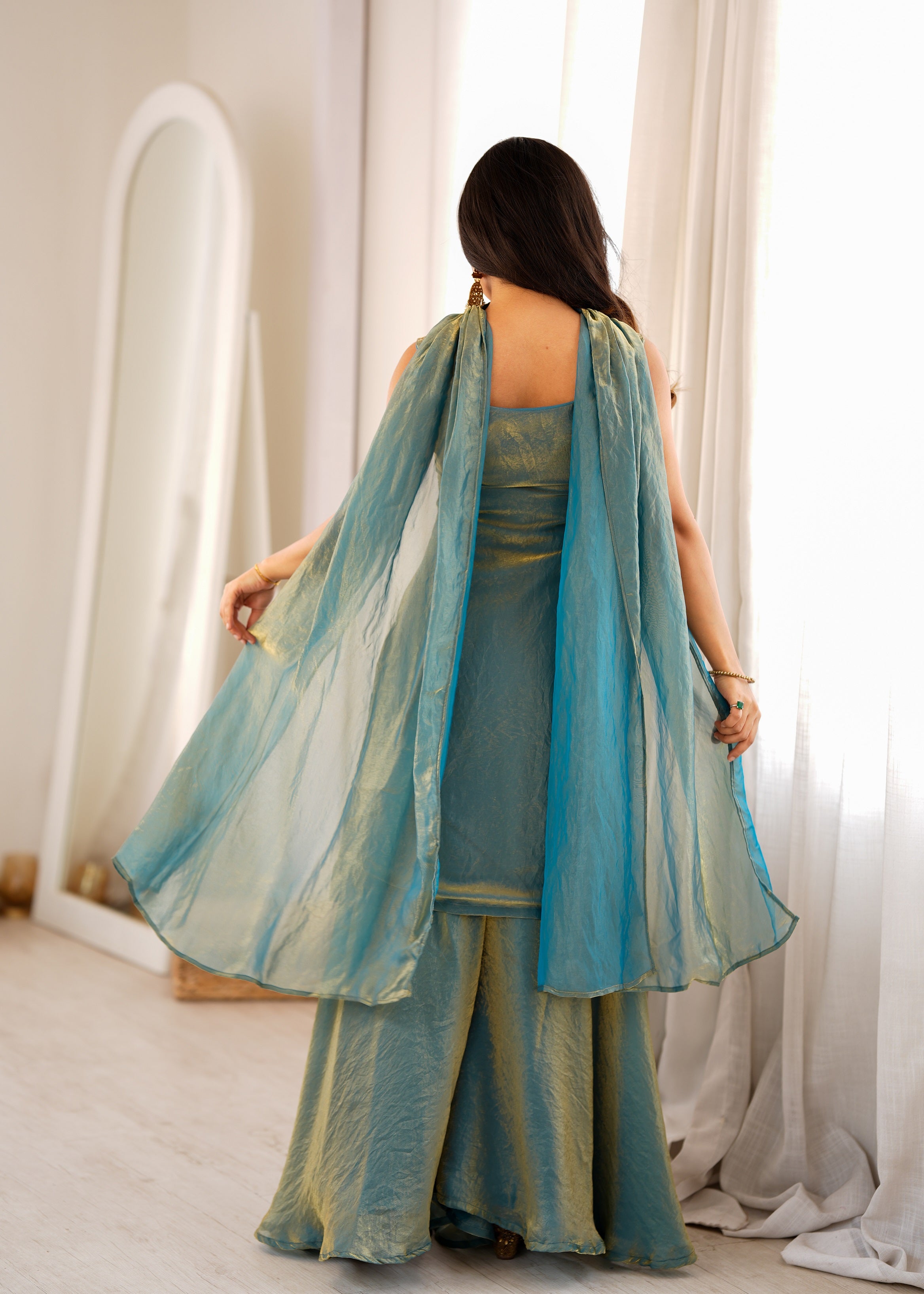 Designer teal blue fendy silk sharara suit with embroidered yoke
