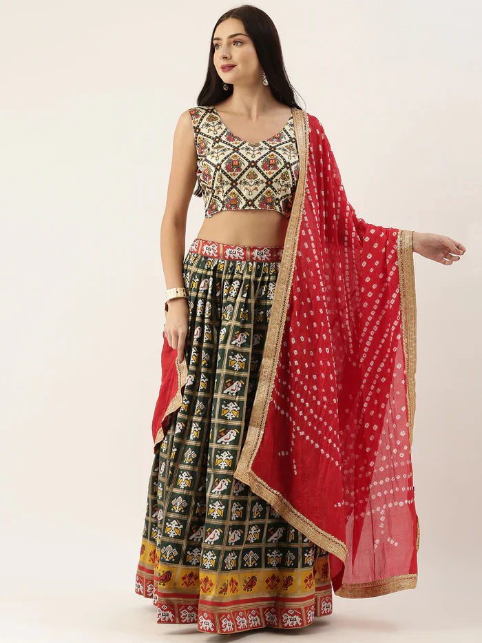 GREEN COLOR SPECIALLY DESIGNED PATOLA JACQUARD LEHENGA CHOLI WITH BANDHEJ SILK DUPATTA