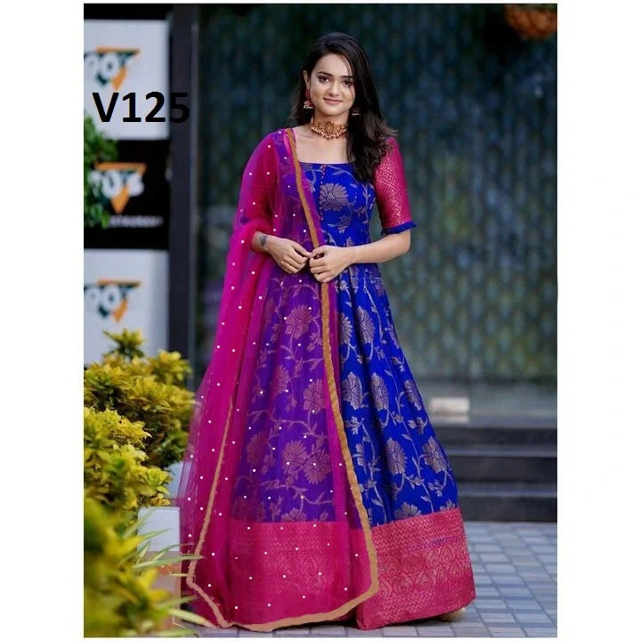 Beautiful Royal Blue Colored Partywear Gown With Jacquard Border And Dupatta