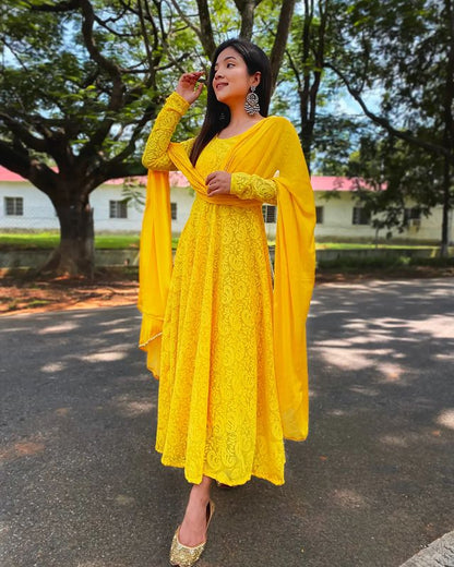 Intricate Yellow Colored Chikankari Worked Georgette Gown with Dupatta Set