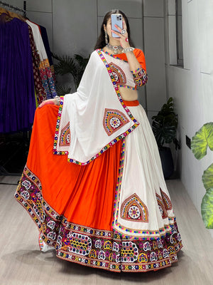 Orange and White Traditional Gamthi Work Navratri Lehenga with Real Mirror Work and Layer Patta Border by The Beauty Queen Surat