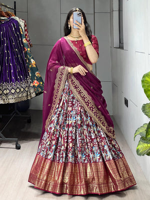 Wine Maroon Soft Dola Silk Lehenga Choli featuring an all-over traditional print and a heavy gold contrast foil work border by The Beauty Queen