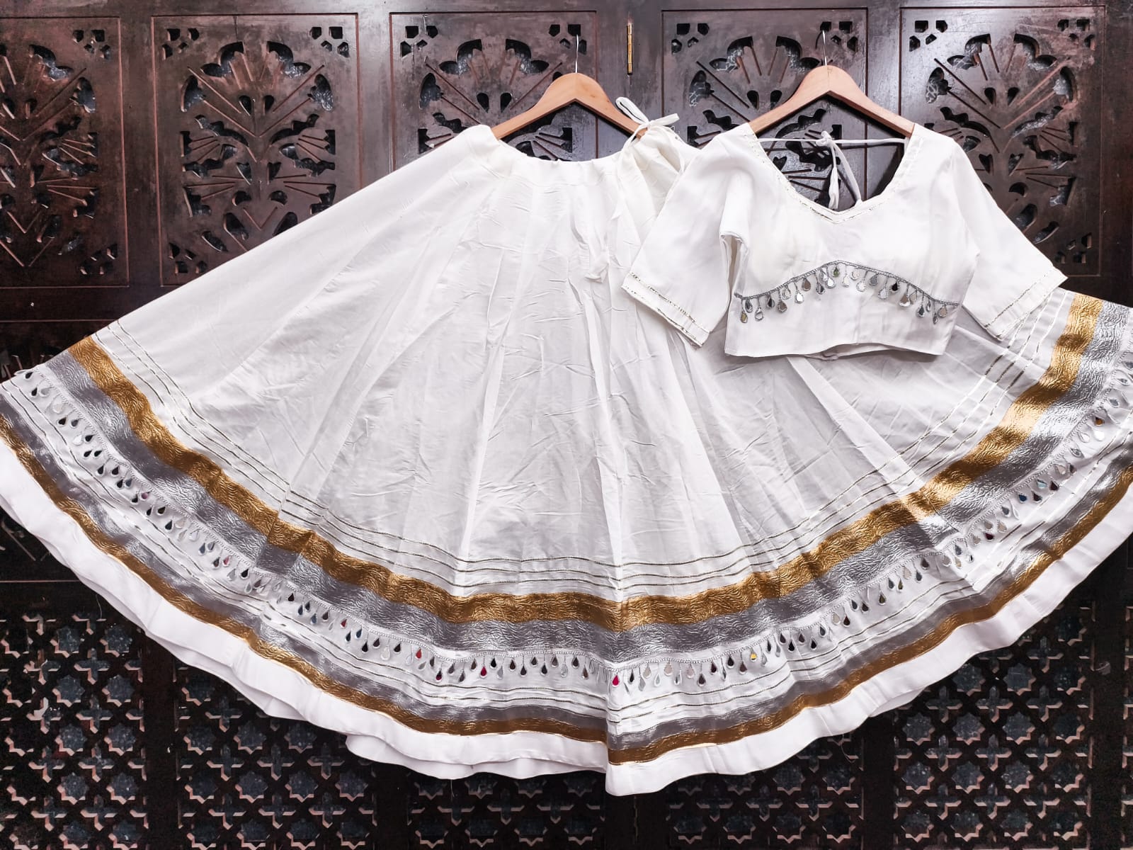 Pristine Pure White Cotton Navratri Special Kalidar Flared Lehenga Choli Set with Dual-Tone Gold & Silver Lappa Borders, Original Teardrop Real Mirror Lace Work & Back Tie-Up Choli