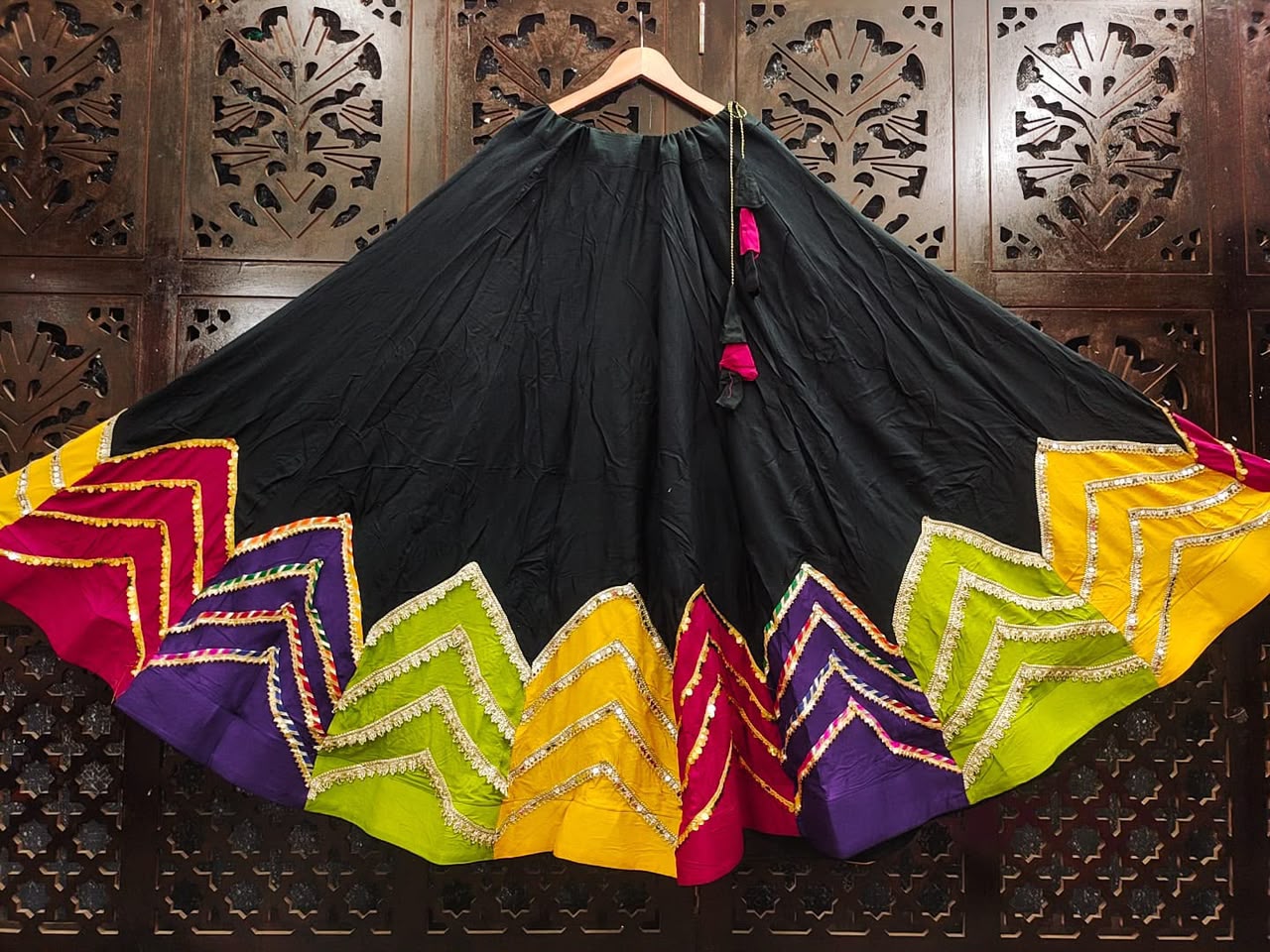 Jet Black Rayon Cotton Navratri Special High-Flare Stitched Lehenga Skirt with Multi-Color Chevron Patchwork Border, Gold & Silver Lace Work & Latkan Drawstring