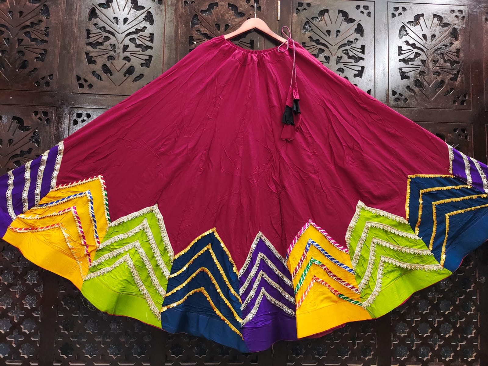 Magenta Maroon Rayon Cotton Navratri Special High-Flare Stitched Lehenga Skirt with Multi-Color Chevron Patchwork Border, Gold & Silver Lace Work & Latkan Drawstring