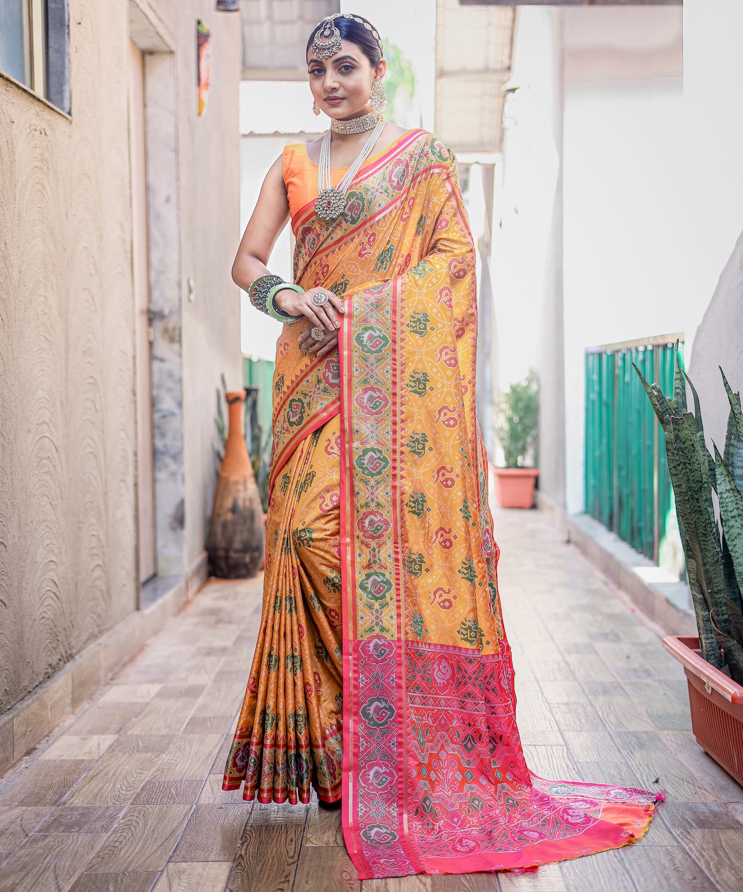 Yellow Soft Elegant Patola Silk With All Over Meenakari Patola Weaving Saree