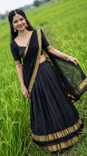 Black Kanci Cotton Zari Weaving Work South Indian Half Saree Langa Voni Set flat lay view by The Beauty Queen