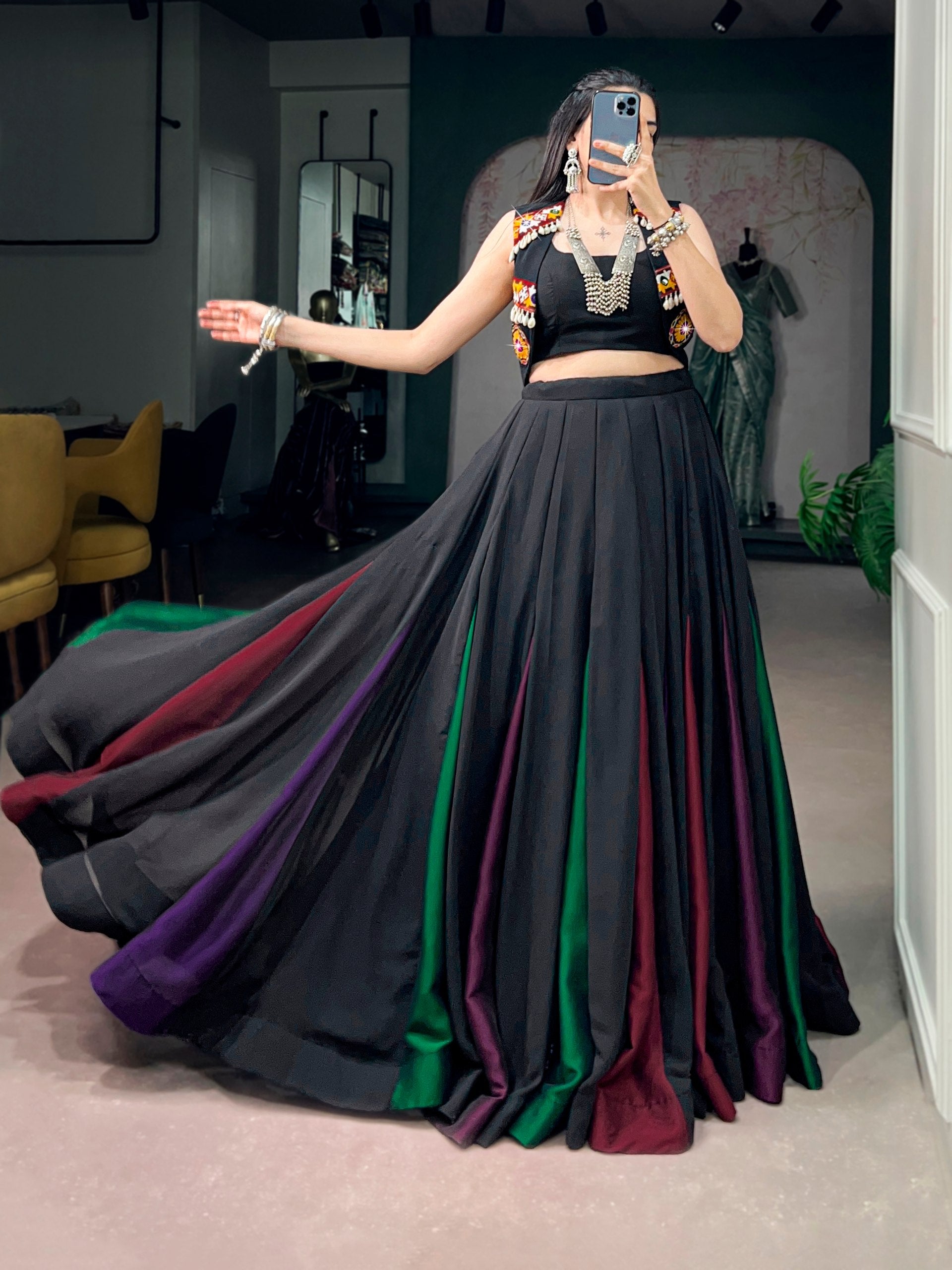 Model wearing Black Lightweight Georgette Traditional Gamthi Work And Enhanced With Kodi Navratri Lehenga Choli Set by The Beauty Queen