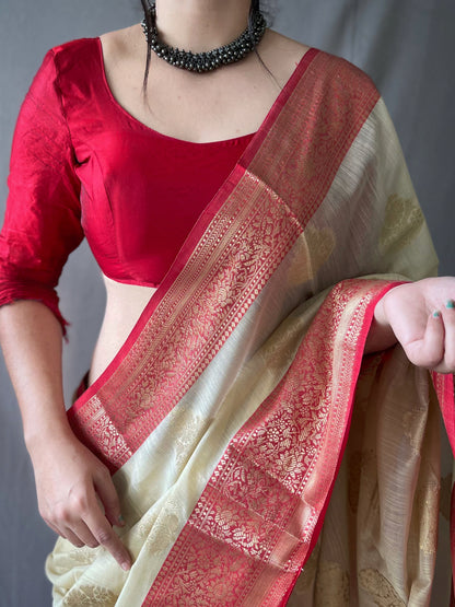 Cream Soft Linen Weaving Sarees With Contrast Weaving Border And Pallu. Paired With Contrast Unstitched Blouse.