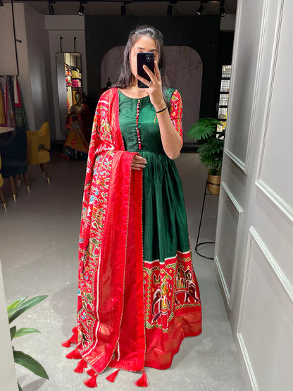 Green Color Patola And Foil Printed Dola Silk Gown