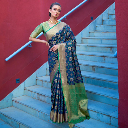 Innovative Dark Blue Colored Festive Wear Patola Woven Silk Saree