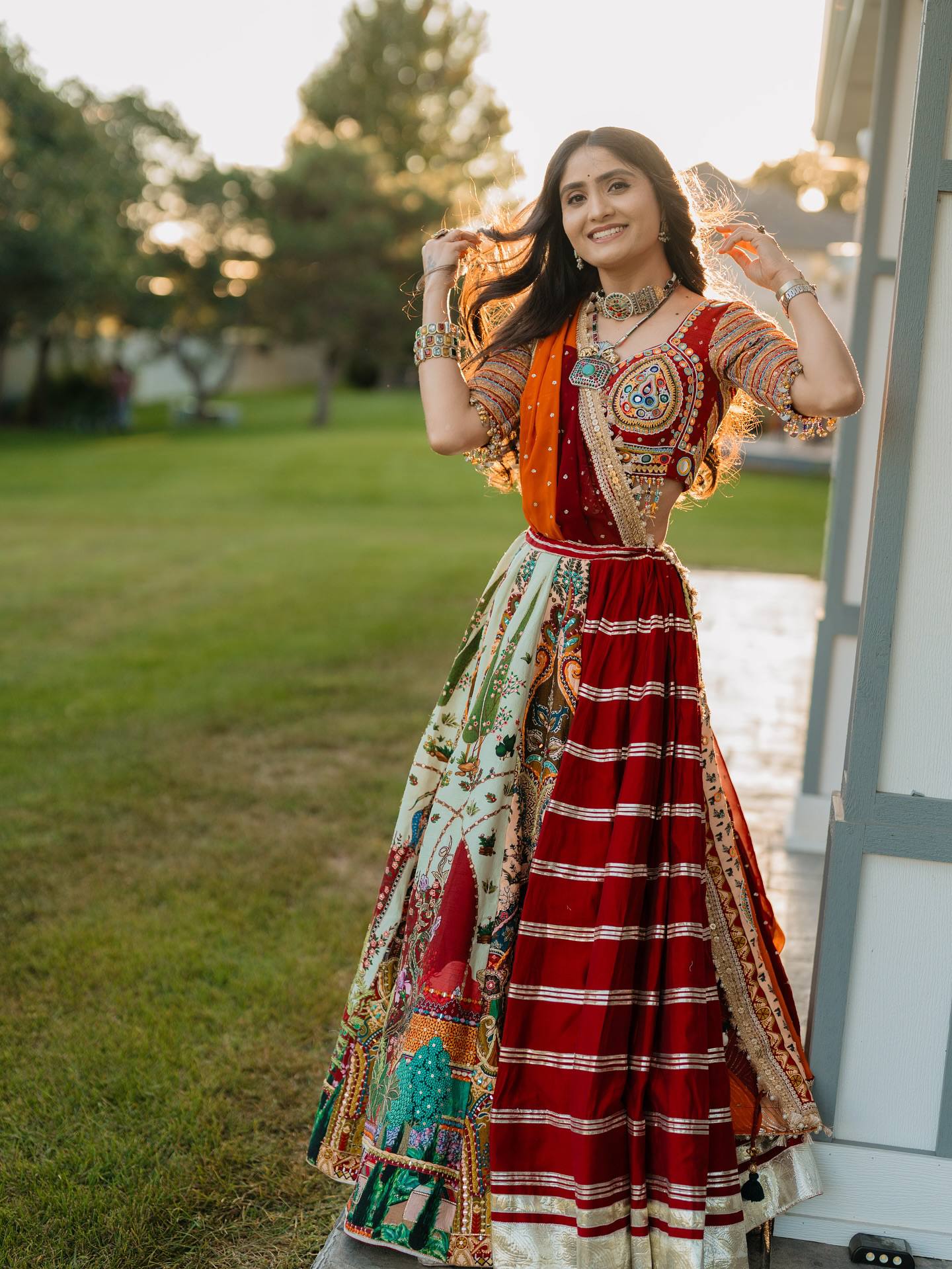 Model Wearing Maroon And Light Mint Green Heavy Muslin Cotton Real Mirror Work Navratri Lehenga Choli Set By The Beauty Queen