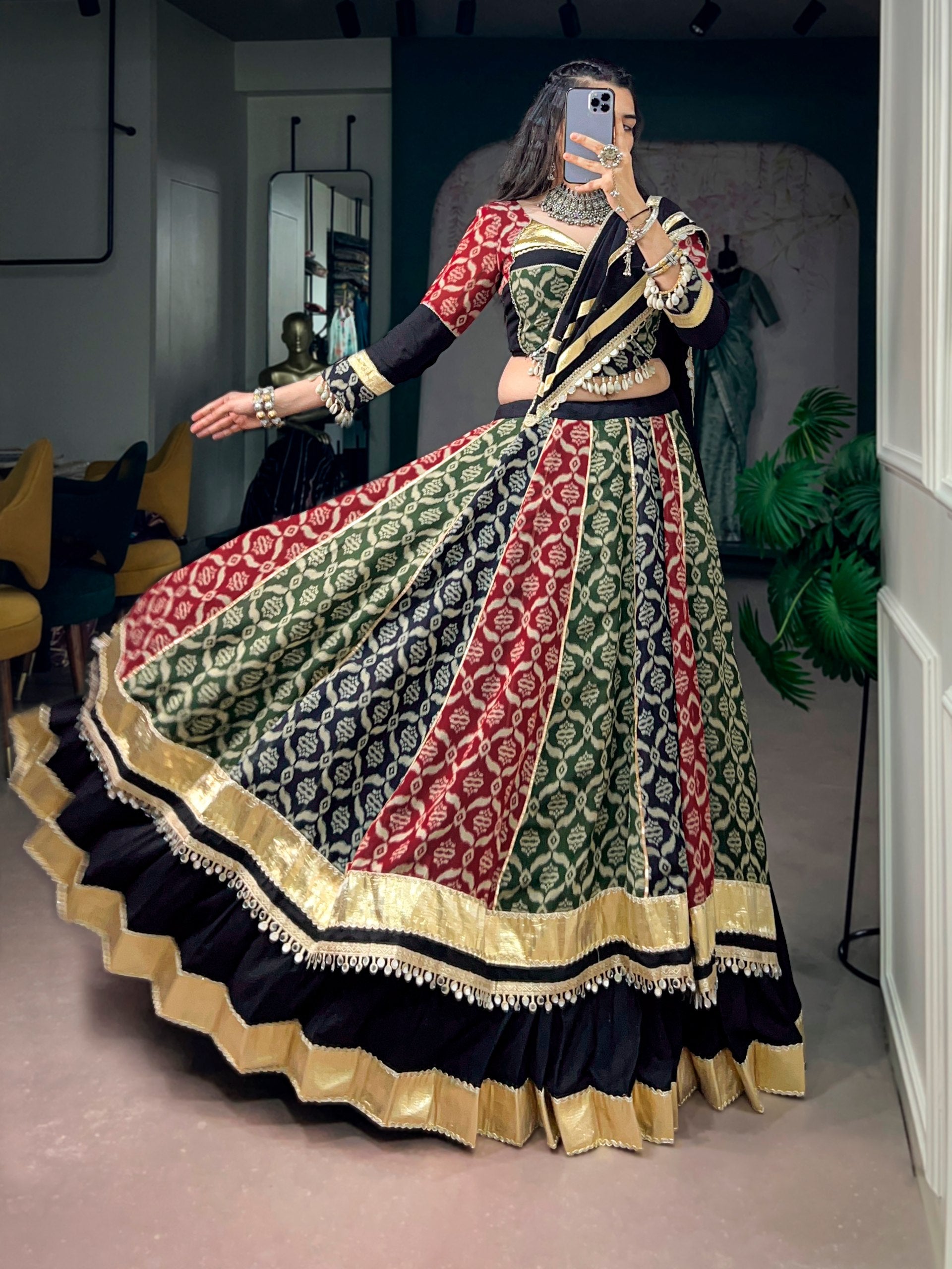 Model wearing Multi-Color Pure Rayon Fabric Adorned With Heritage Prints & Elegant Lace Accents Canvas Stitching Navratri Lehenga Choli Set by The Beauty Queen