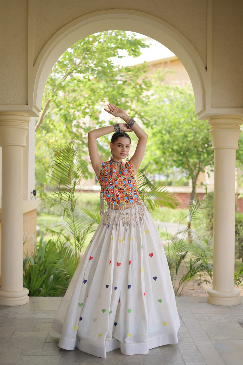 Model Posing In Off White Cora Cotton Heart Thread Embroidery Navratri Lehenga Choli Set By The Beauty Queen