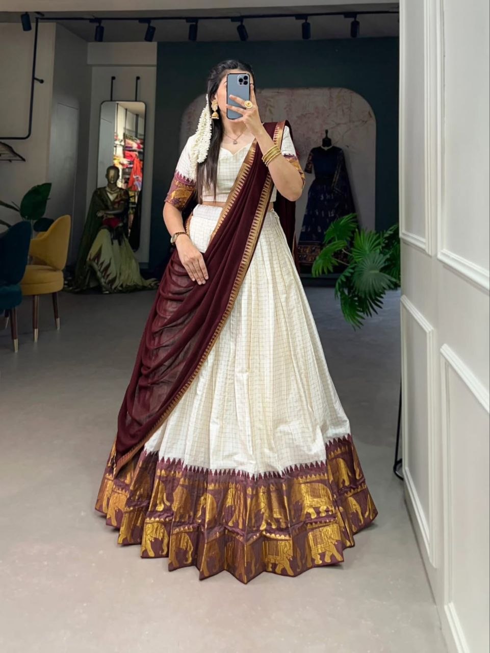 Model Wearing Off White Poly Cotton Checks With Zari Weaving Elephant Border Half Saree Langa Voni Set By The Beauty Queen