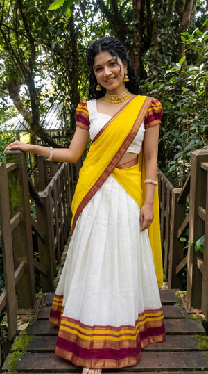 Off-White, Vibrant Yellow, and Magenta Mul Cotton Zari Weaving Work South Indian Half Saree Langa Voni Set flat lay view by The Beauty Queen