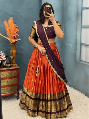 Orange and Dark Brown Kanjiveram Silk Fully Stitched Half Saree Lehenga Choli Set flat lay view by The Beauty Queen