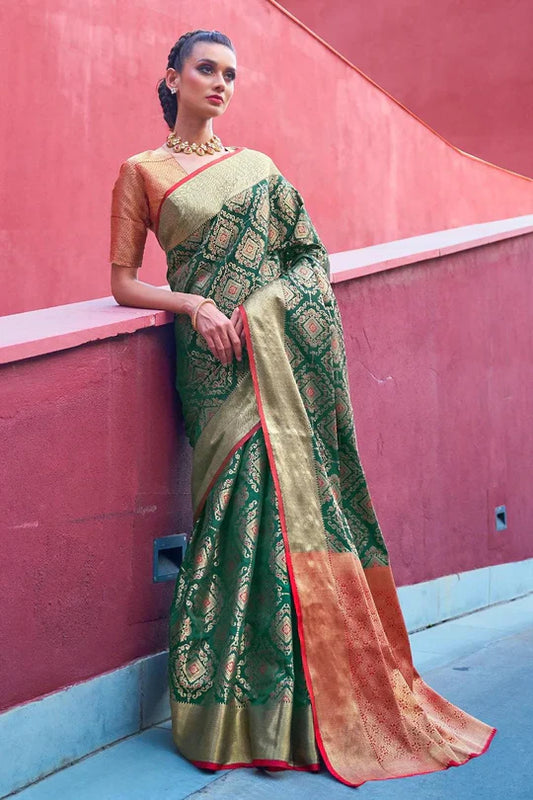 Green Colored Festive Wear Patola Woven Silk Saree