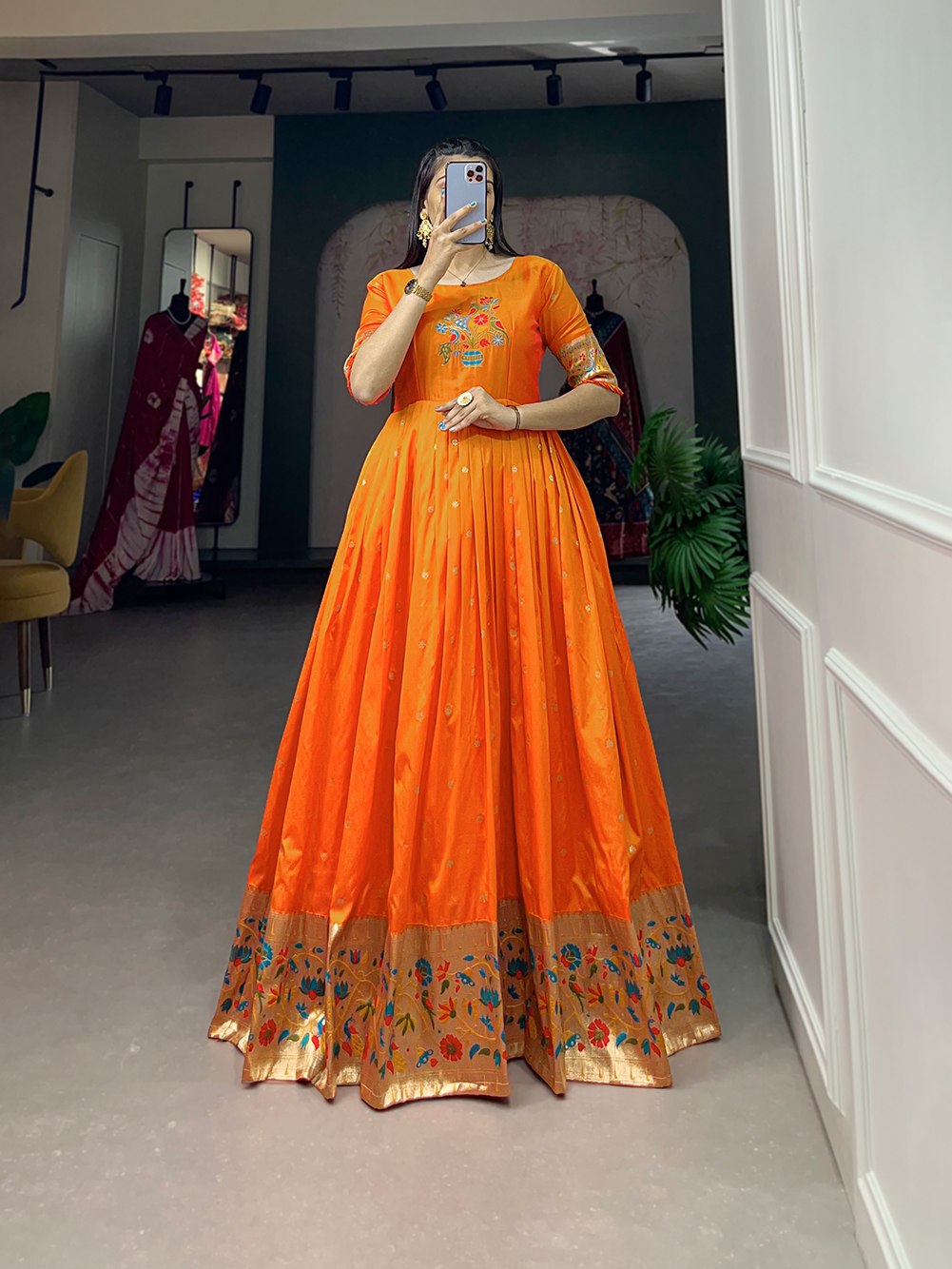 Vibrant Orange Jacquard Silk Paithani Dress Gown with Traditional Zari Work by The Beauty Queen Surat