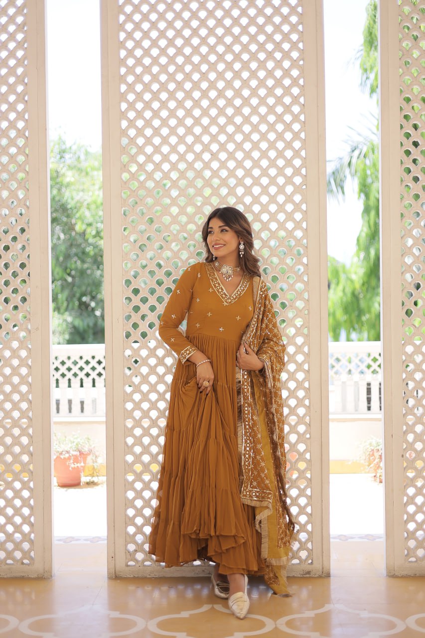 Mustard Color Designer Festive Wear Gown featuring Attractive Sequins Embroidery Work Gown