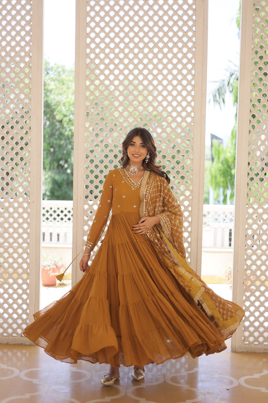 Mustard Color Designer Festive Wear Gown featuring Attractive Sequins Embroidery Work Gown