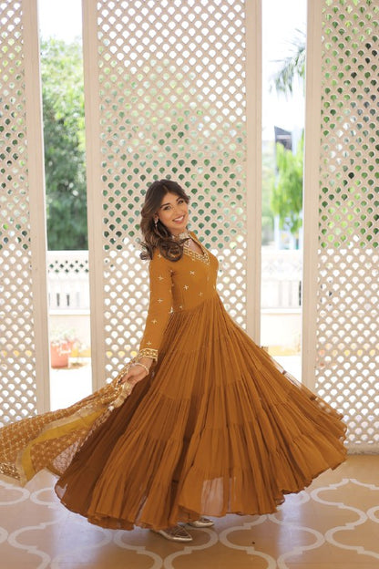 Mustard Color Designer Festive Wear Gown featuring Attractive Sequins Embroidery Work Gown