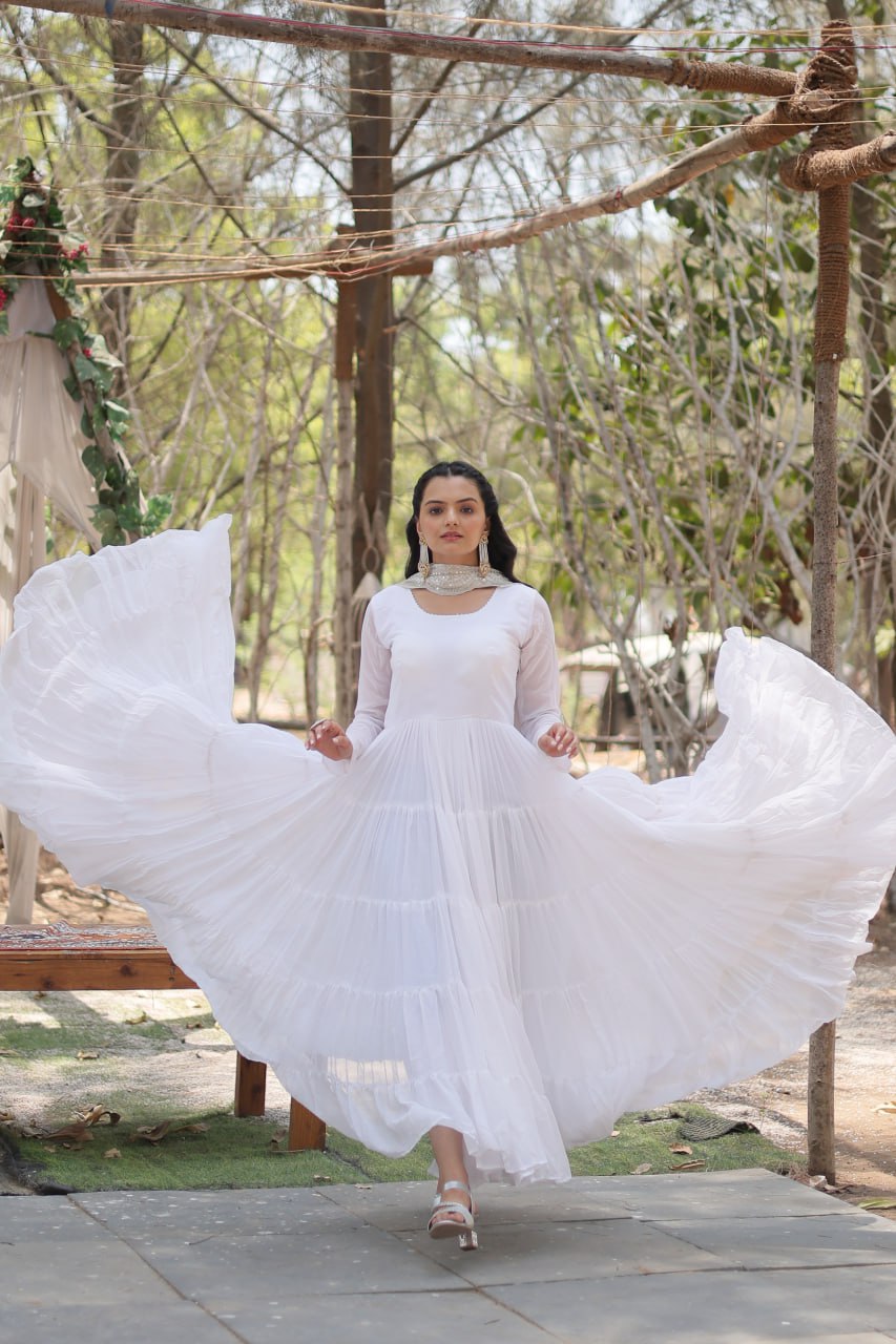 White Faux Georgette Faux Blooming With Rich Sequins Embroidered Work Gown